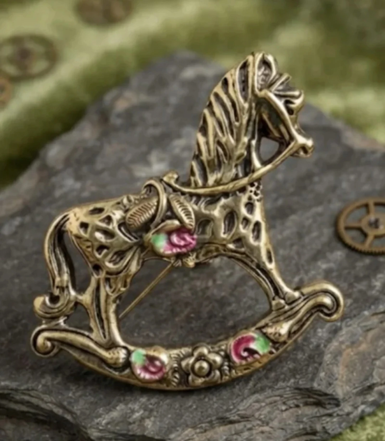 Broche de caballito balancín